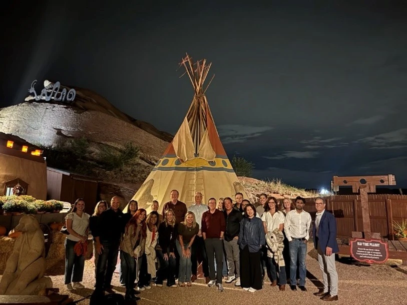 a group of people posing for a photo