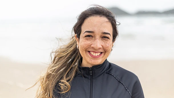a woman smiling at the camera